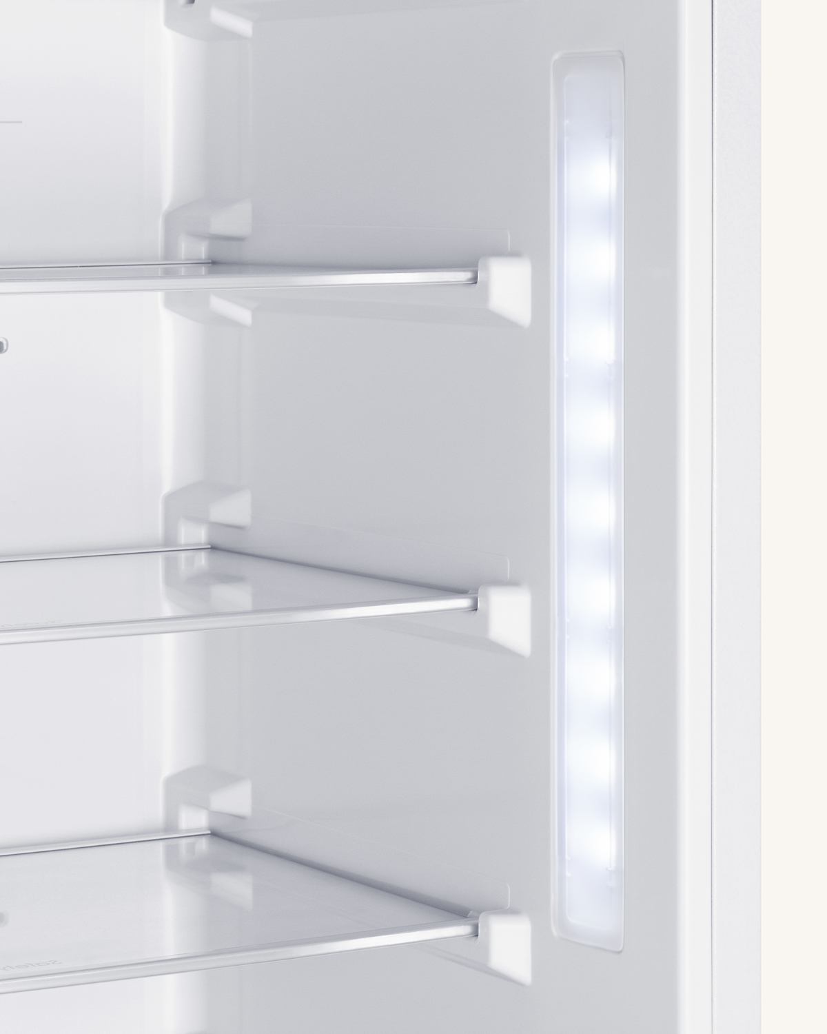 ENERGY STAR certified fully integrated bottom mount counter depth refrigerator-freezer with unfinished front to accept custom panels and fit 76 7/8